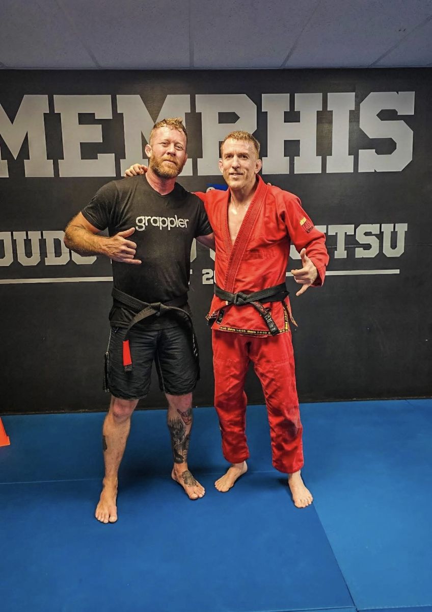 Nathan Waits with a black belt training partner at a Memphis jiu-jitsu academy