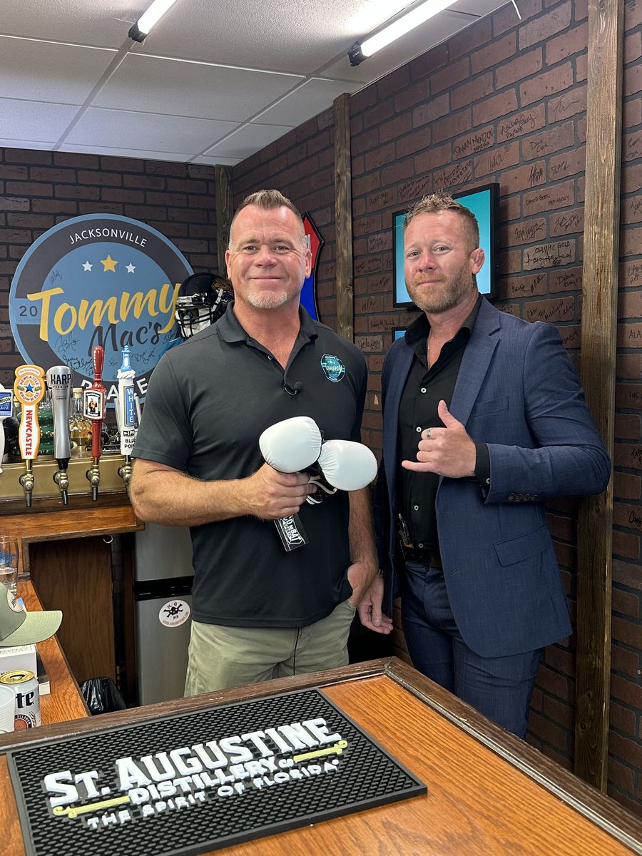 Nathan Waits with the Biz Champions host at Tommy Mac's in Jacksonville